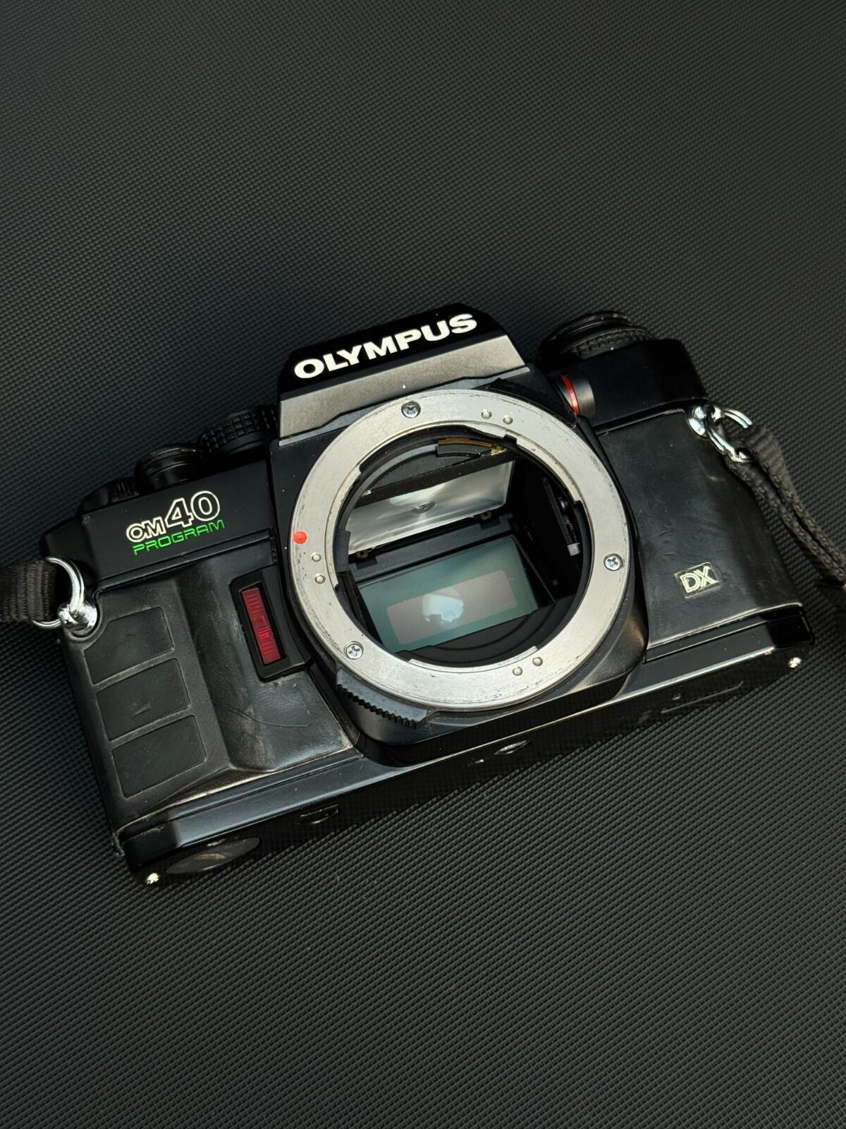 Olympus OM40 35mm Vintage SLR Film Camera Body Only - Spares or Repair (G240)