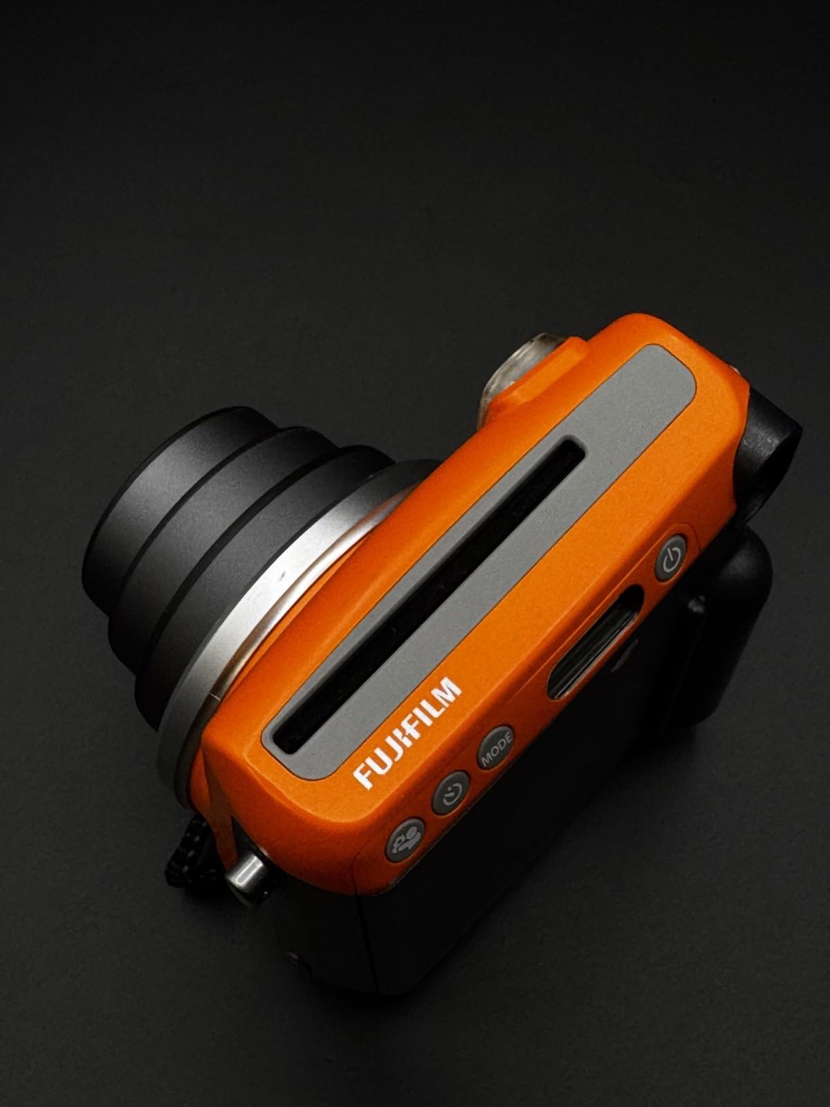 Fujifilm Instax Mini 70 Orange Instant Camera + Batteries & Film (Read Details)