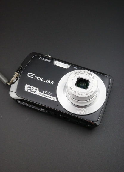 Casio Exilim EX-Z2 12.1MP Digital Camera Boxed + Charger & New Battery - Working