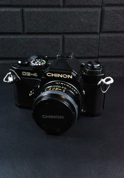Chinon CE-4 SLR 35mm Film Camera + Auto Chinon 50mm 1 .7 Faulty Spares or Repair