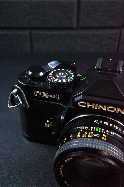 Chinon CE-4 SLR 35mm Film Camera + Auto Chinon 50mm 1 .7 Faulty Spares or Repair