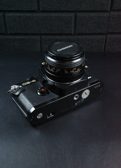 Chinon CE-4 SLR 35mm Film Camera + Auto Chinon 50mm 1 .7 Faulty Spares or Repair